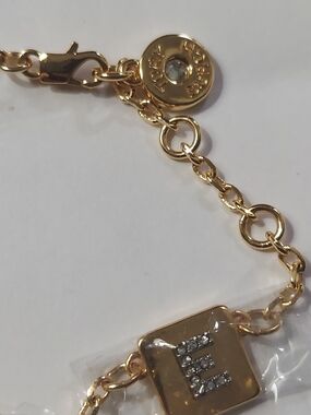 Tory Burch gold-tone LOVE message charm bracelet